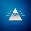 Silver Masons symbol All-seeing eye of God icon isolated on blue background. The eye of Providence in the triangle