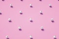 Silver matt Christmas balls on pink background