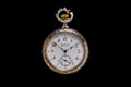 Silver mechanical antique pocket watch on black isolated background. Retro pocketwatch with second, minute and hour hand