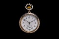 Silver mechanical antique pocket watch on black isolated background. Retro pocketwatch with second, minute and hour hand