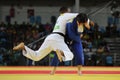 Silver medalist Judoka Audrey Tcheumeo of France in white in action against Sol Kyong of North Korea during women`s 78 kg match