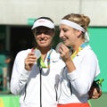 Silver medalists team Switzerland Timea Bacsinszky (L) and Martina Hingis during medal ceremony after doubles final