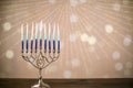 A silver menorah for the Jewish holiday Hanukkah with eight unlit candles Royalty Free Stock Photo