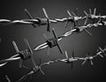 Metal barbed wire on black background. Royalty Free Stock Photo