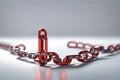 Silver Metal Chain With Multiple Linked Components In Front Of A Grey Blurred Background close up view. Royalty Free Stock Photo