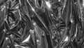 Silver metal foil, wrinkled and shiny. Close-up, abstract image background Royalty Free Stock Photo