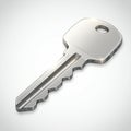 Silver metal key with a standard rectangular head and a rounded edge. The bow has a Royalty Free Stock Photo