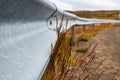 Metal Safety Guardrail Along The Road With Tall Grass And Weeds Growing Royalty Free Stock Photo