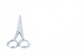 Silver metal scissors for haircut on white background Royalty Free Stock Photo