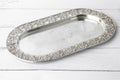 Silver metal tray isolated on white background. Empty plate retro design Royalty Free Stock Photo