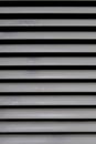 Silver metal wide blinds. Silver background