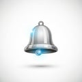 A silver metallic bell with a glossy finish is centered against a plain background. It has Royalty Free Stock Photo