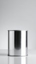 Silver Metallic Canister Displayed Against a Clean White Background in a Studio Royalty Free Stock Photo
