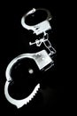 Silver metallic handcuffs for erotic bondage games Royalty Free Stock Photo