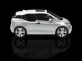 Silver metallic small electric car - side view