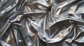 The silver metallic texture resembles shiny wrapping foil with a smooth whitegray backdrop ideal for use in wallpaper or Royalty Free Stock Photo