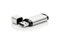 A silver metallic usb flash drive with its cap removed isolated on white background Royalty Free Stock Photo