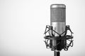 Silver microphone on the gray background. Copy space Royalty Free Stock Photo