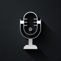 Silver Microphone icon isolated on black background. On air radio mic microphone. Speaker sign. Long shadow style Royalty Free Stock Photo