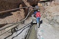 Silver miners pushing the cart, Potosi Bolivia Royalty Free Stock Photo