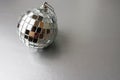 Silver mirror music club disco ball xmas festive Christmas ball, Christmas toy plastered on sparkles black and white background Royalty Free Stock Photo