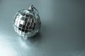 Silver mirror music club disco ball xmas festive Christmas ball, Christmas toy plastered on sparkles black and white background Royalty Free Stock Photo