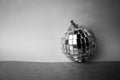 Silver mirror music club disco ball xmas festive Christmas ball, Christmas toy plastered on sparkles black and white background Royalty Free Stock Photo