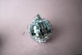 Silver mirror music club disco ball xmas festive Christmas ball, Christmas toy plastered on sparkles black and white background Royalty Free Stock Photo