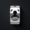 Silver Mobile phone and face recognition icon isolated on black background. Face identification scanner icon. Facial id