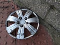 Silver Modern Car Hubcap Abandoned Royalty Free Stock Photo