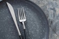 Silver modern cutlery on stone Royalty Free Stock Photo