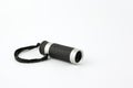 Silver monocular telescope on white background