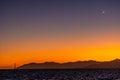 A silver new moon over the Golden Gate Bridge at sunset Royalty Free Stock Photo