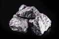 silver nugget native to Liberia isolated on black background Royalty Free Stock Photo