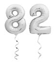 Silver number eighty two 82 made of inflatable balloon with ribbon on white Royalty Free Stock Photo