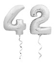 Silver number forty two 42 made of inflatable balloon with ribbon on white Royalty Free Stock Photo