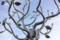 A silver object abstract metal tree art