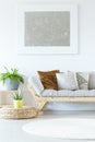 Silver painting above grey settee Royalty Free Stock Photo