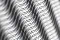 Silver close up waves structure background. Nice paper with space for text.