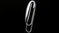 Silver Paperclip On Dark Background: Polished Craftsmanship And High Quality Photo
