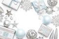 Silver and pastel blue christmas gifts, ornaments and decorations isolated on white background. Christmas border. Royalty Free Stock Photo