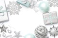 Silver and pastel blue christmas gifts, ornaments and decorations isolated on white background. Royalty Free Stock Photo