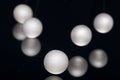 Silver pearl balls on a black background Royalty Free Stock Photo