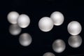 Silver pearl balls on a black background Royalty Free Stock Photo