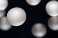 Silver pearl balls on a black background