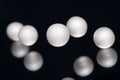 silver pearl balls on a black background Royalty Free Stock Photo