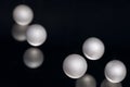 Silver pearl balls on a black background Royalty Free Stock Photo