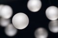 Silver pearl balls on a black background