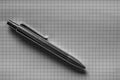 Silver Pen on Grid Paper Royalty Free Stock Photo