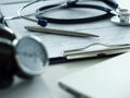 Silver pen lying at doctor worktable